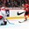 MONTREAL, CANADA - DECEMBER 30: Switzerland's Damien Riat #9 lets a shot go against Denmark's Kasper Krog #31 during preliminary round action at the 2017 IIHF World Junior Championship. (Photo by Francois Laplante/HHOF-IIHF Images)

